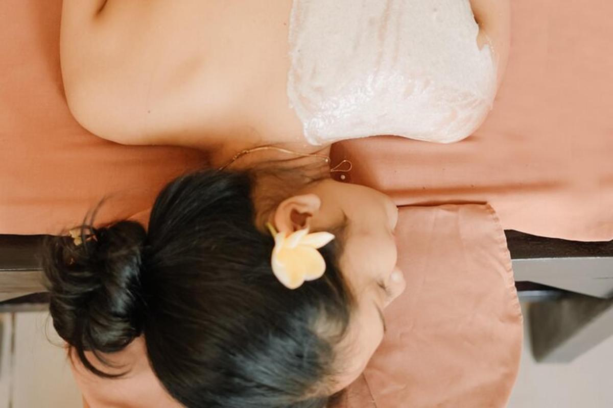 a little girl laying on the floor next to a bride