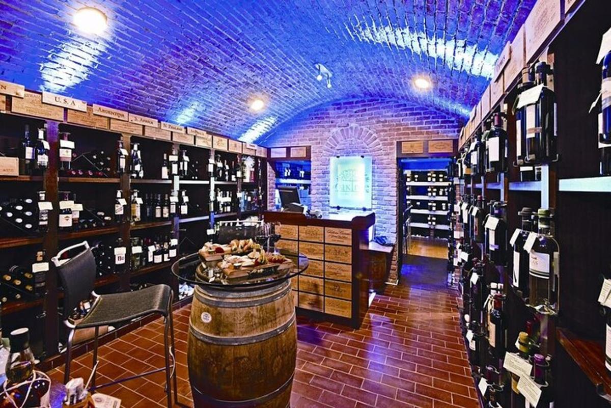 a wine tasting room with a bunch of wine bottles