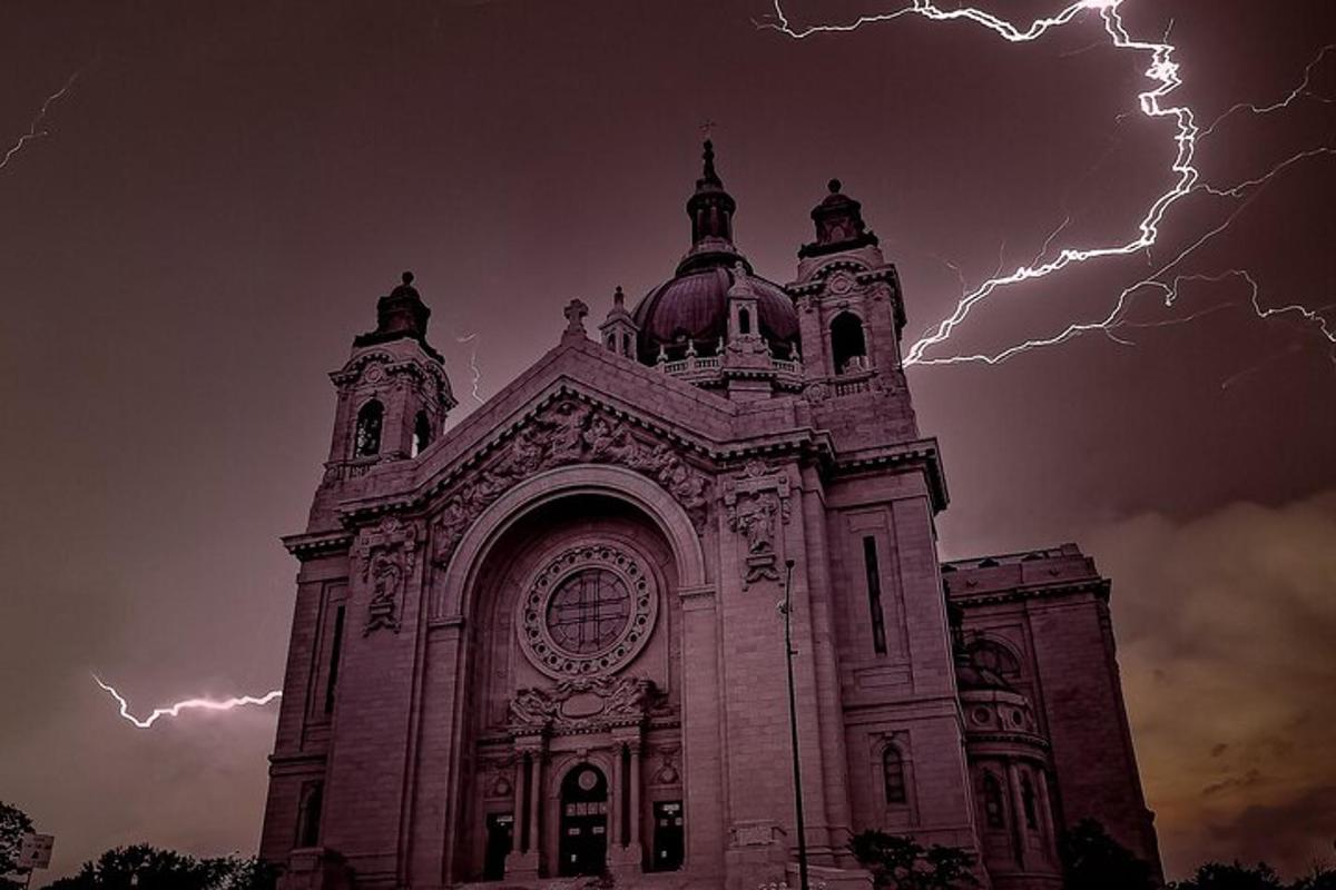 a building with lightning bolts in the sky