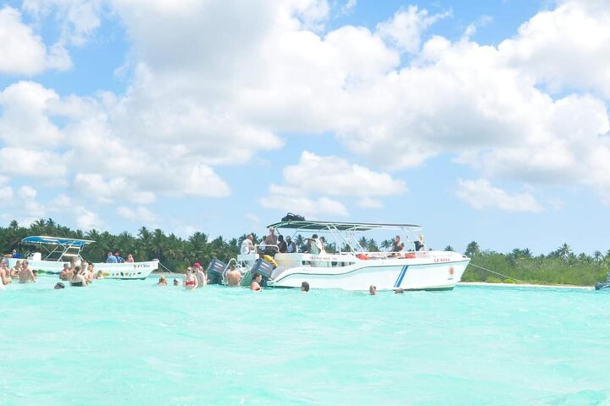 a group of people on a boat in the water
