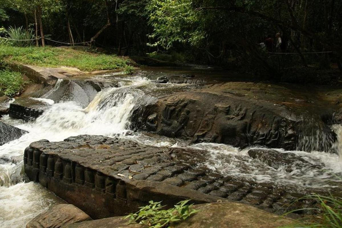 a river with water rushing over the rocks