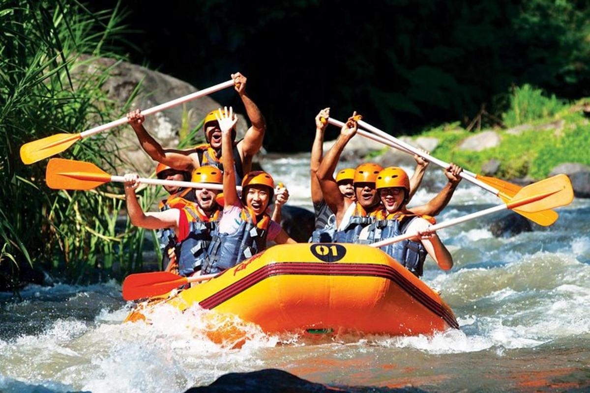 a group of people in a raft on a river