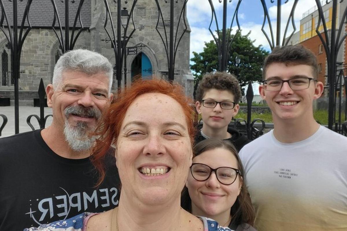 a group of people standing in front of a building