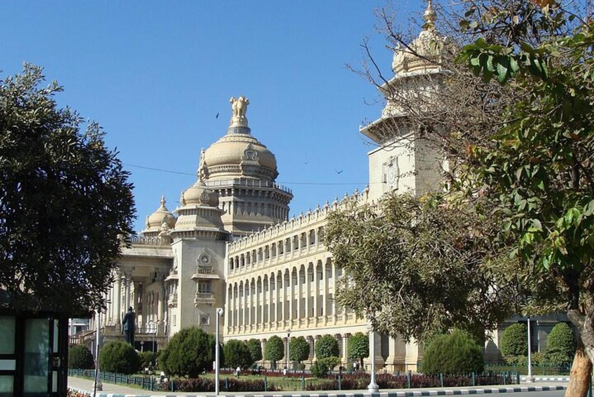 a large building with a statue on top of it