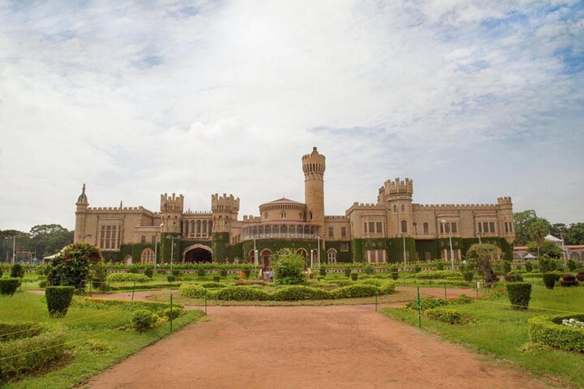 a large building with a garden in front of it