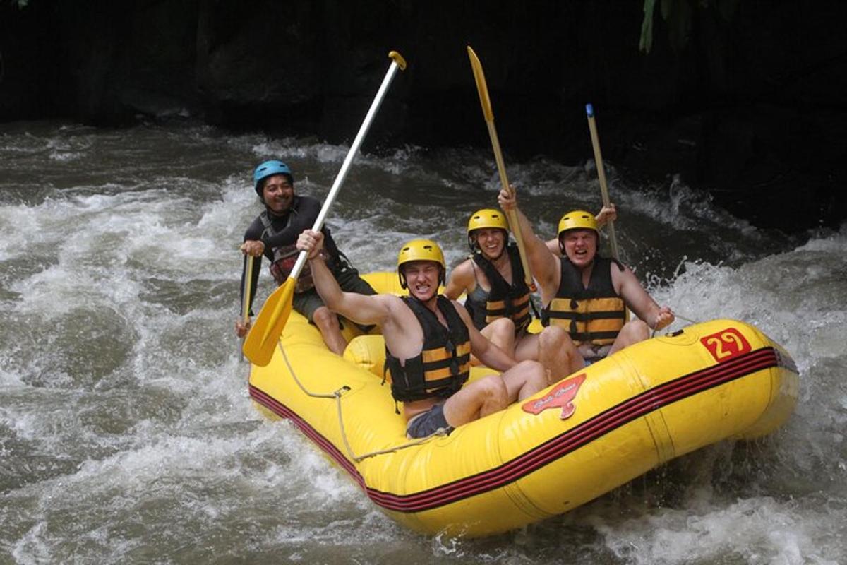 a group of people in a raft on a river