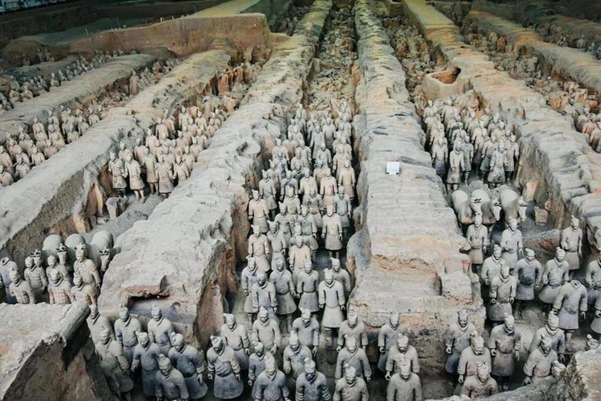 a group of figurines of people in a field
