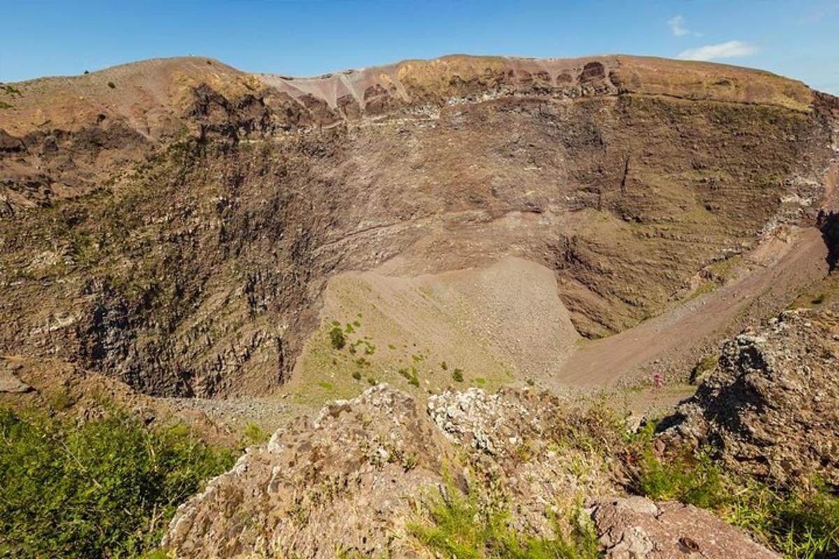 a mountain with a dirt road on top of it
