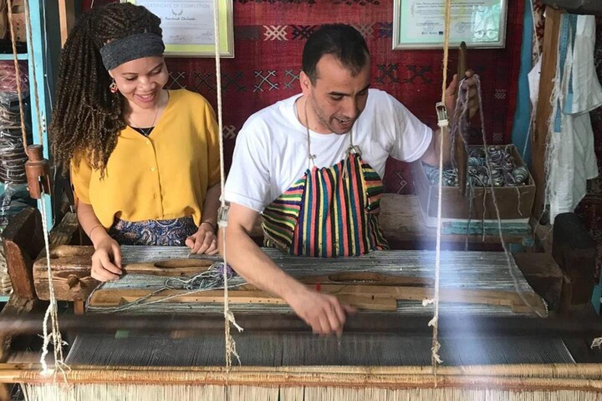 a man and a woman making a piece of wood