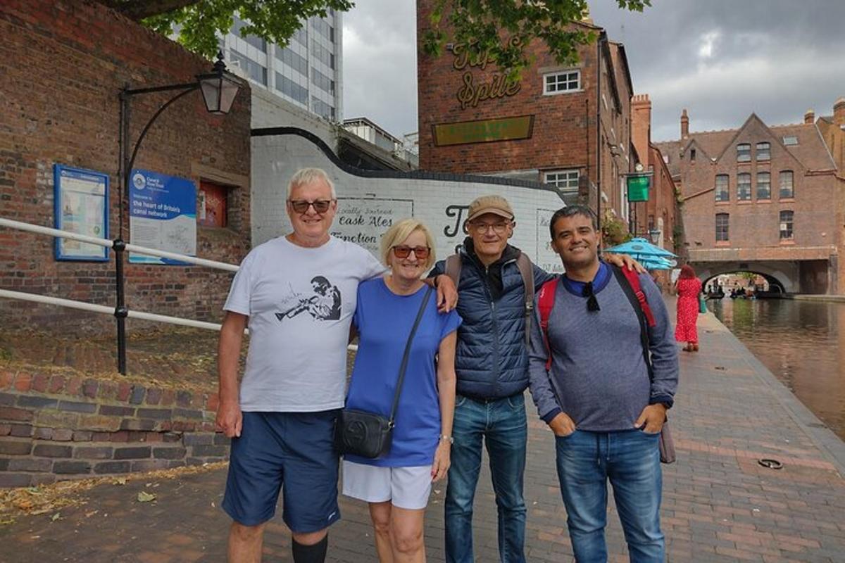 a group of people posing for a picture on a street