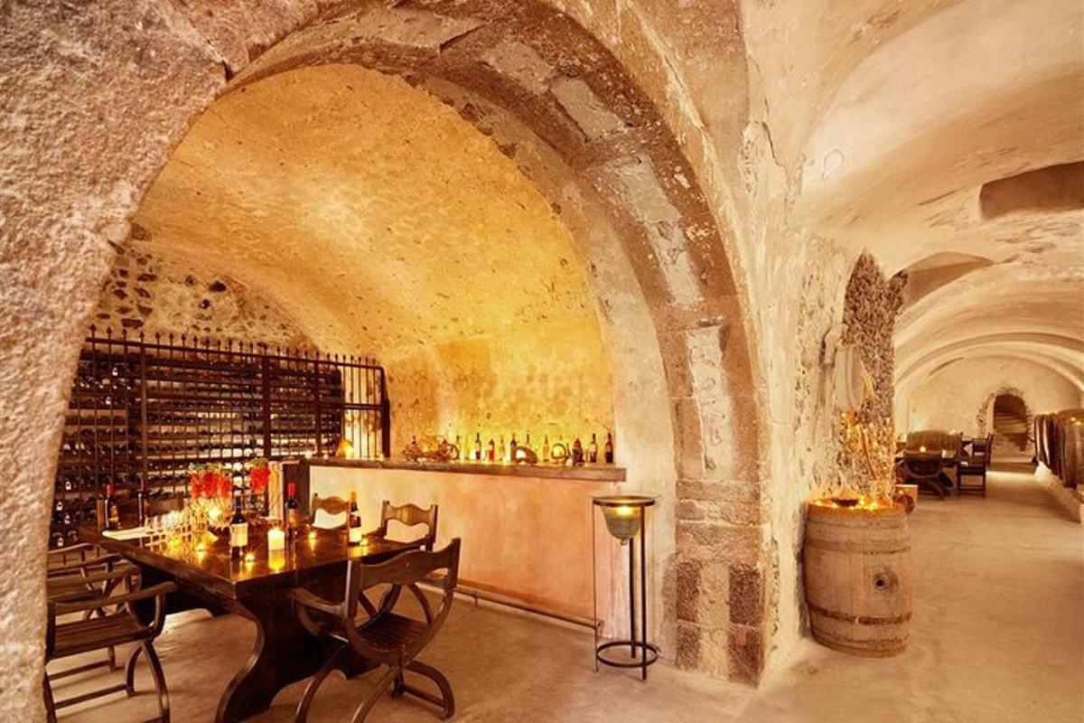 a dining room with a table and a wine cellar