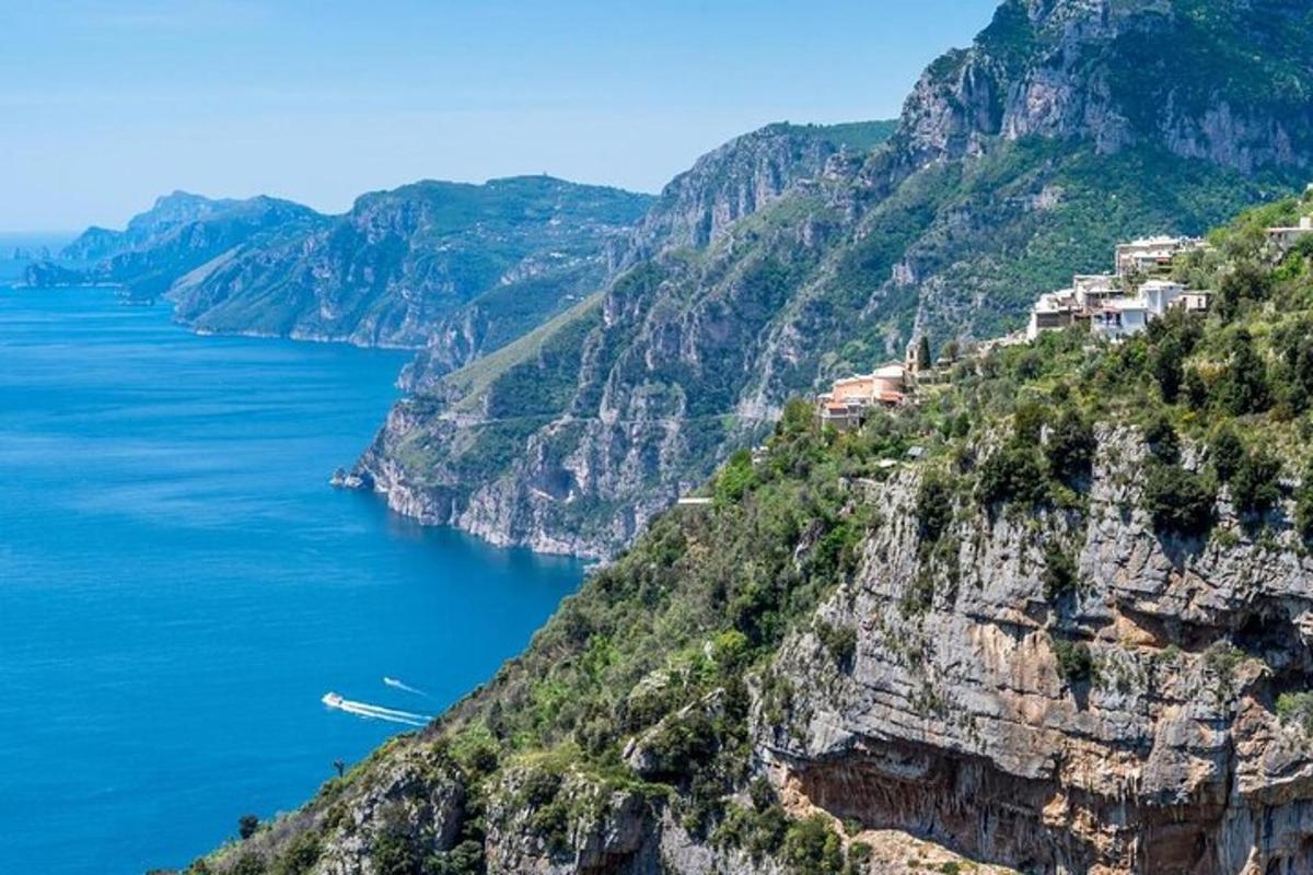 a view of the amalfi coast with houses on a mountain