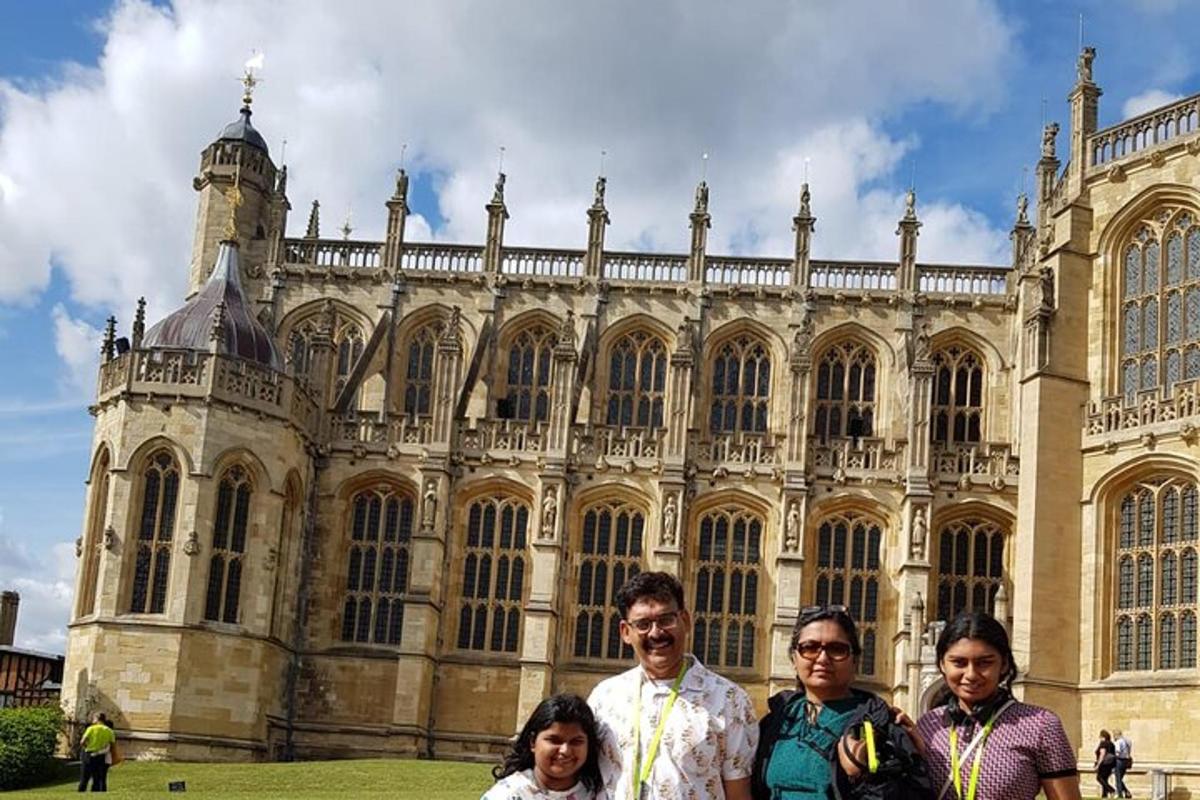 a group of people standing in front of a large building