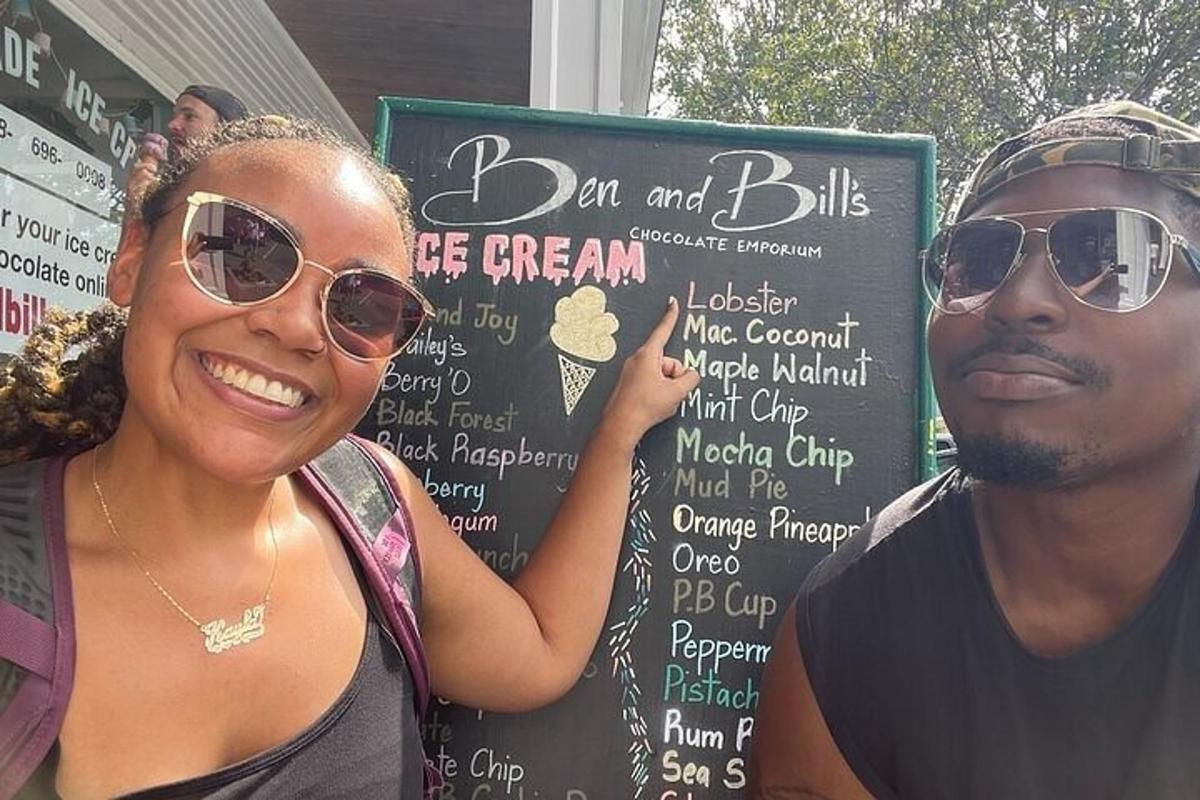 a man and a woman standing in front of a sign