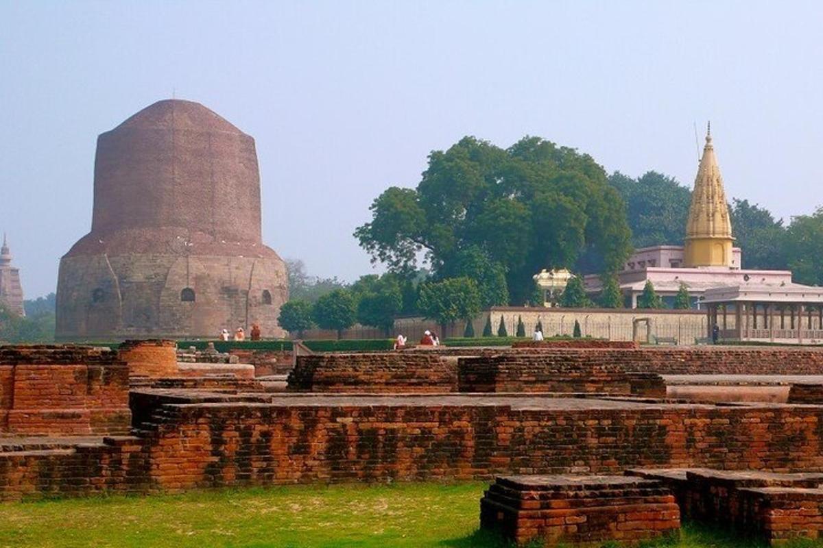 a view of a building with a monument in the background