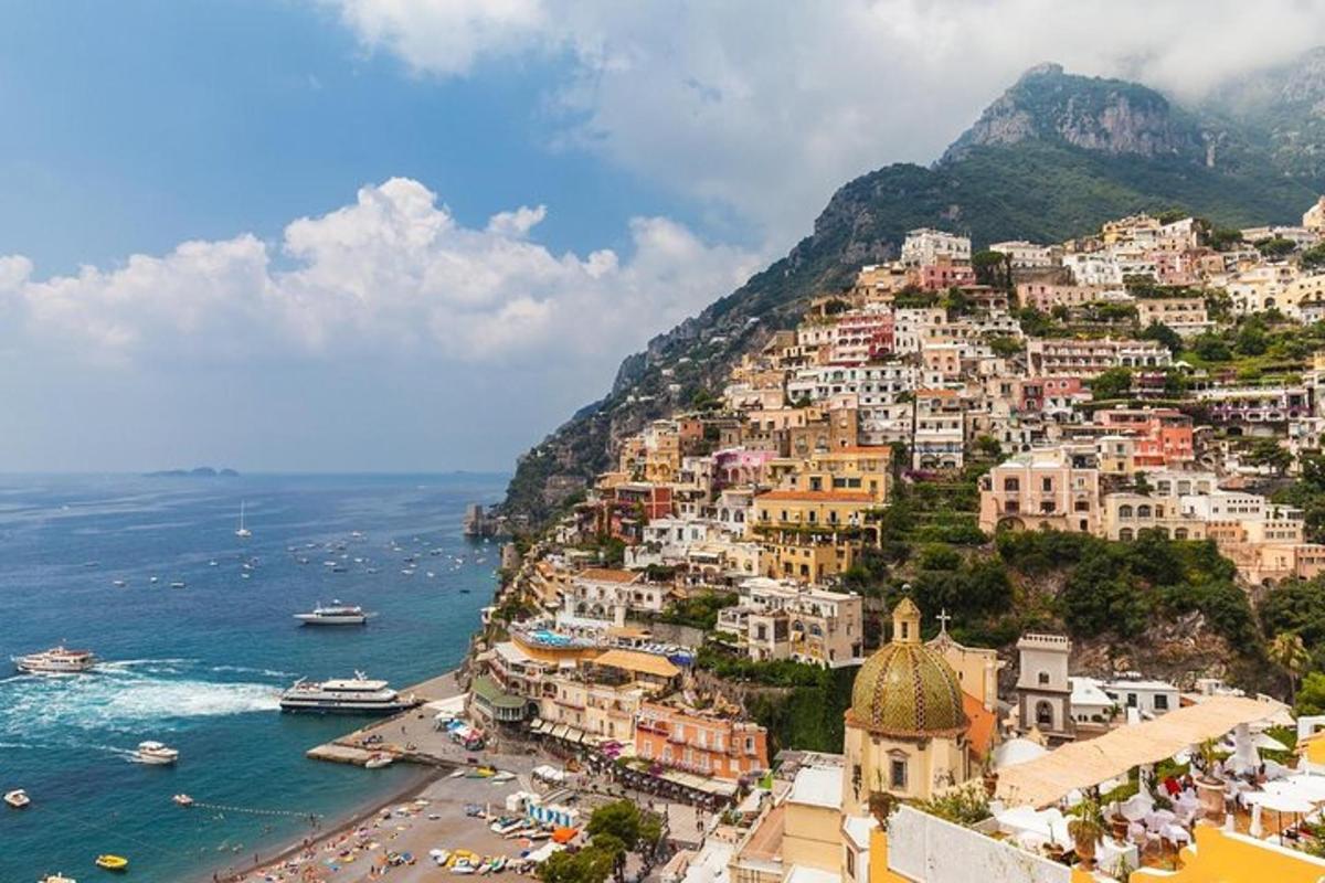 a view of a town on the side of a mountain