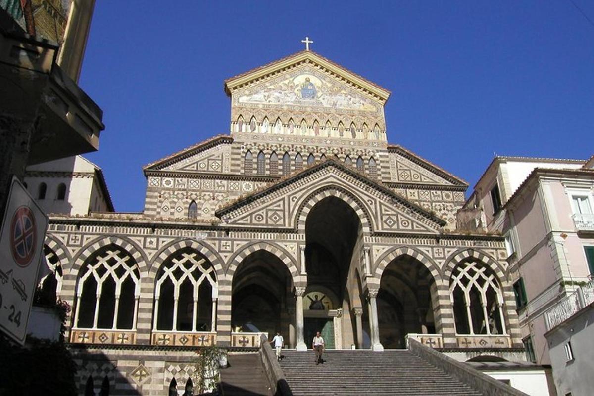 a large building with a cross on top of it