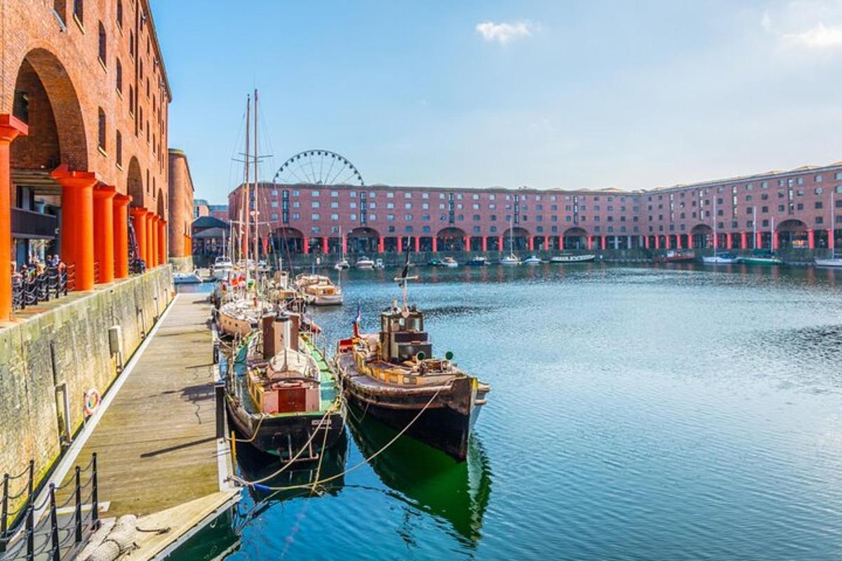 a group of boats docked in the water near a building