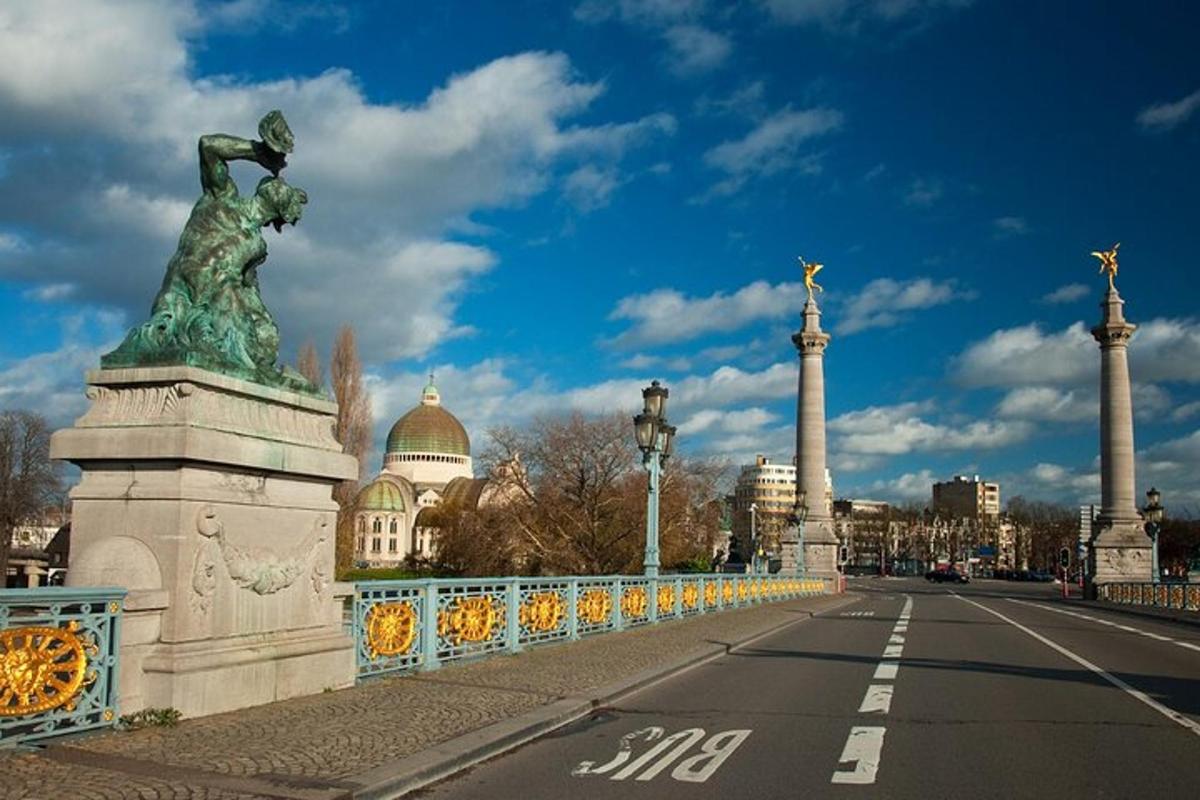 a statue of a woman standing on a bridge