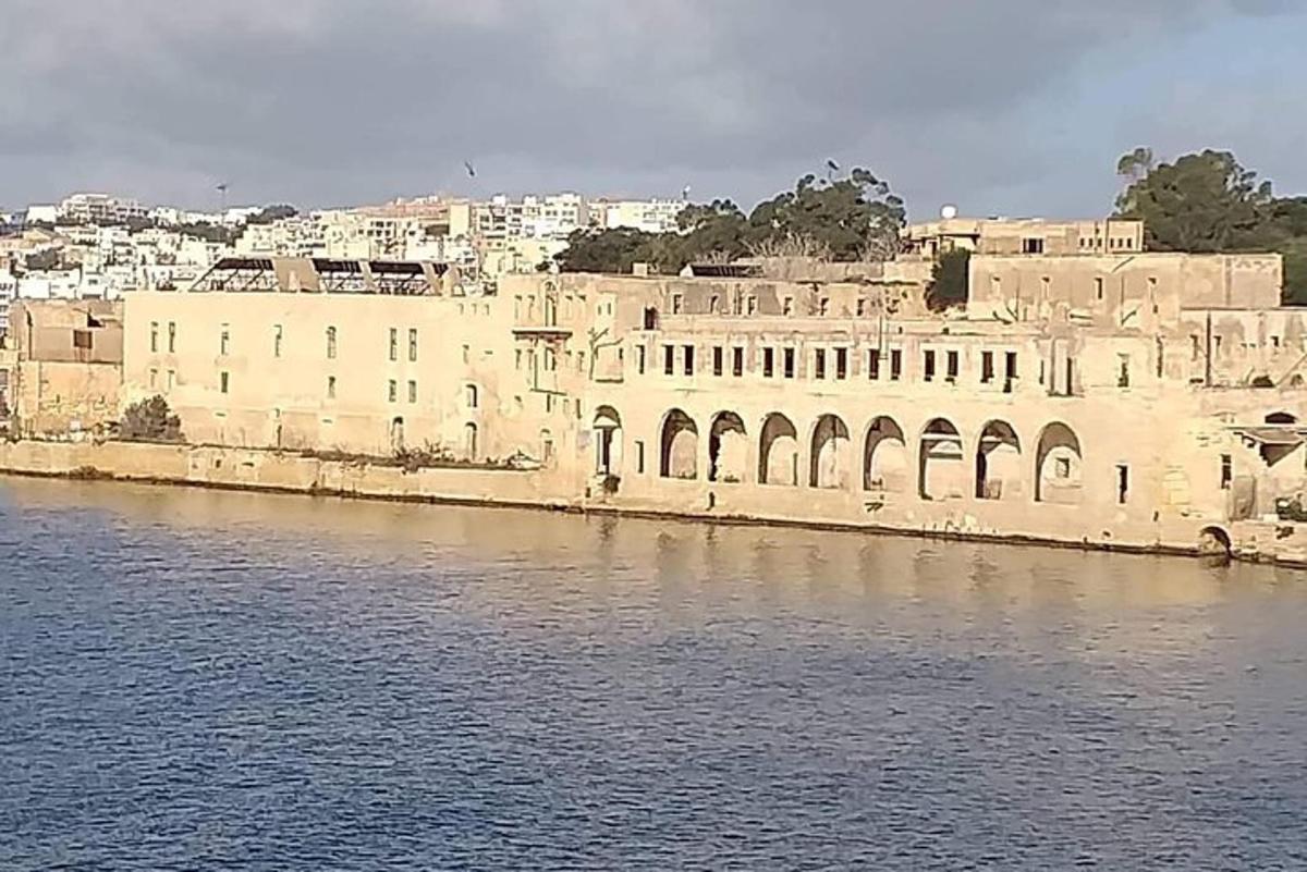 a large building next to a body of water