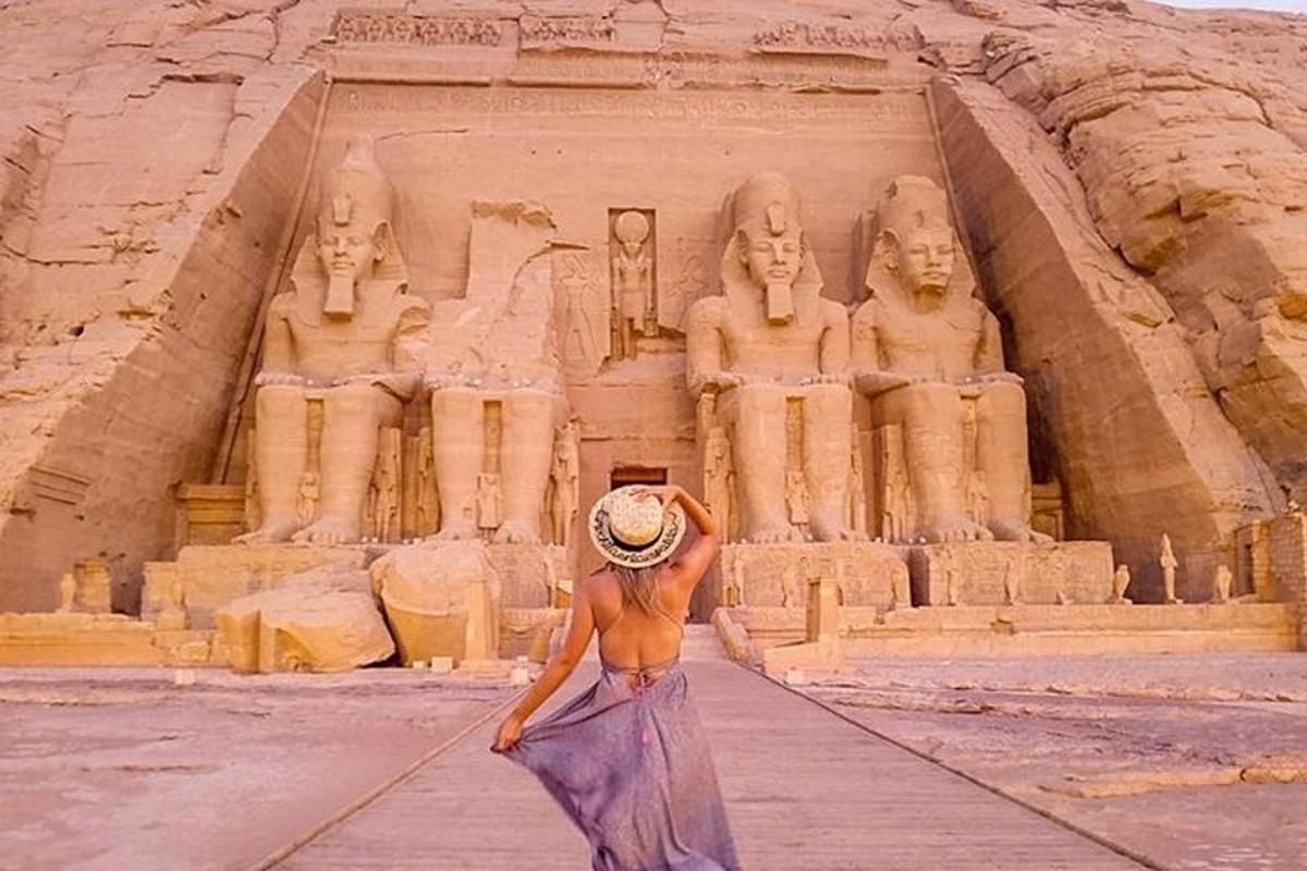 a woman is standing in front of anaraoharaoh