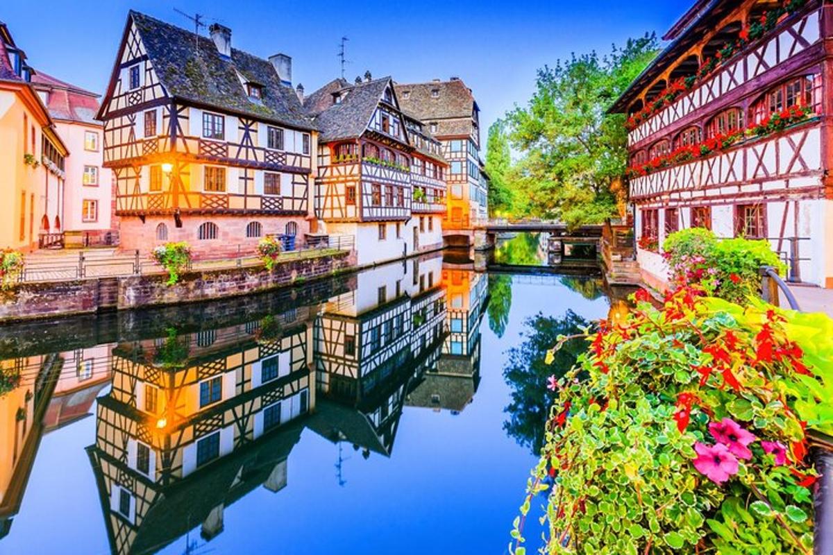 a group of buildings next to a river