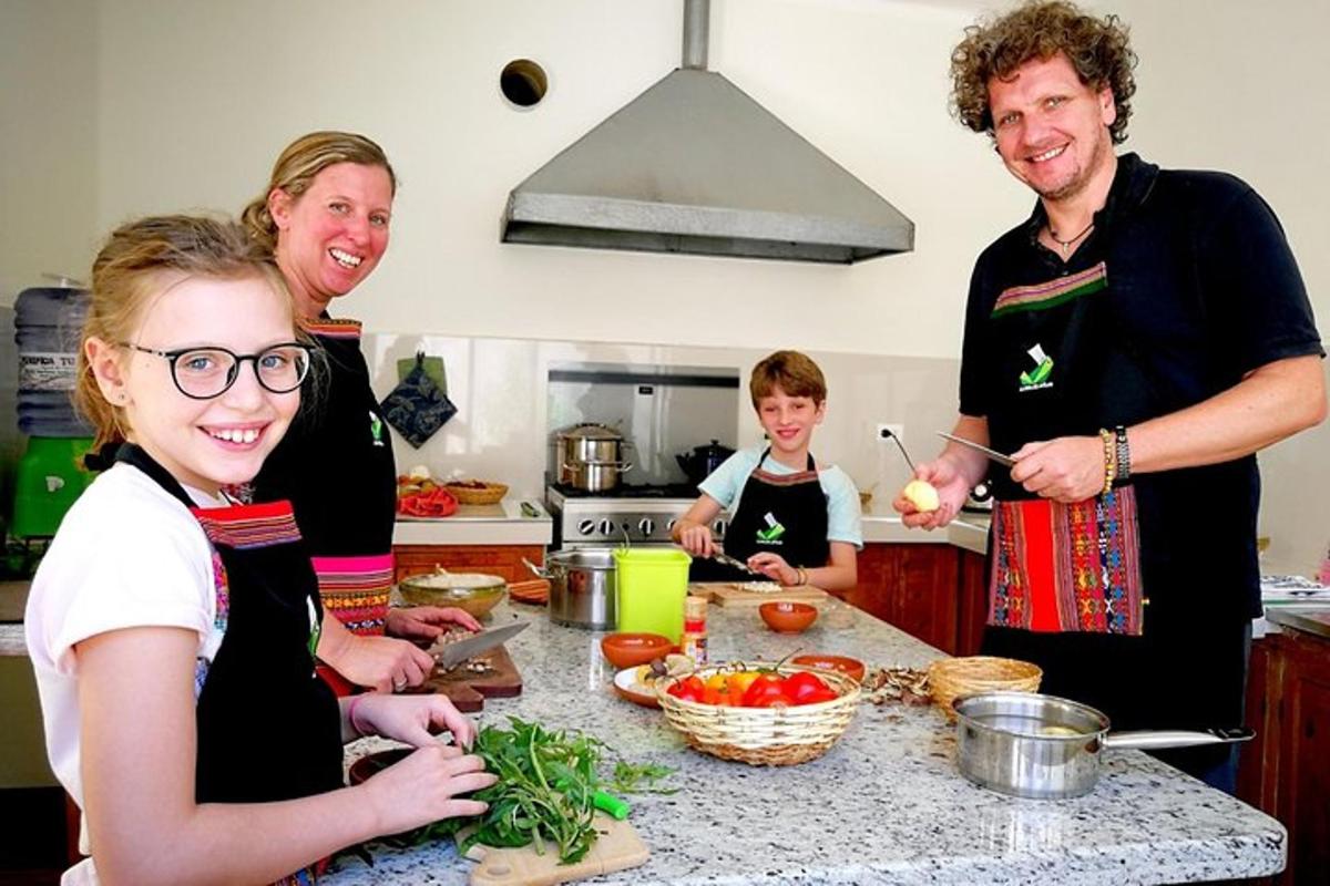 a group of people in a kitchen preparing food