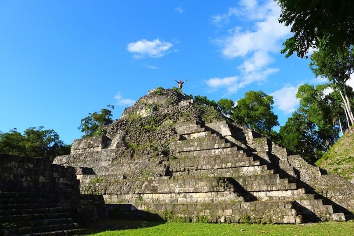 a person standing on top of a pyramid