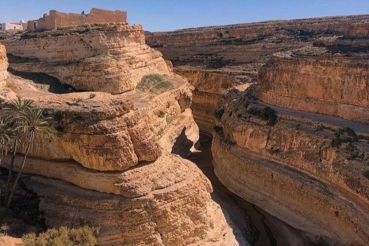 a view of the grand canyon from the top of a cliff