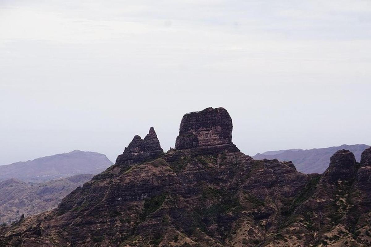 a mountain with rocks on top of it