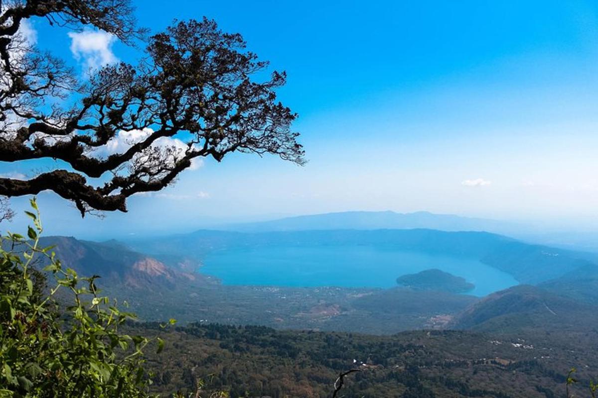 a view of a blue lake from a mountain