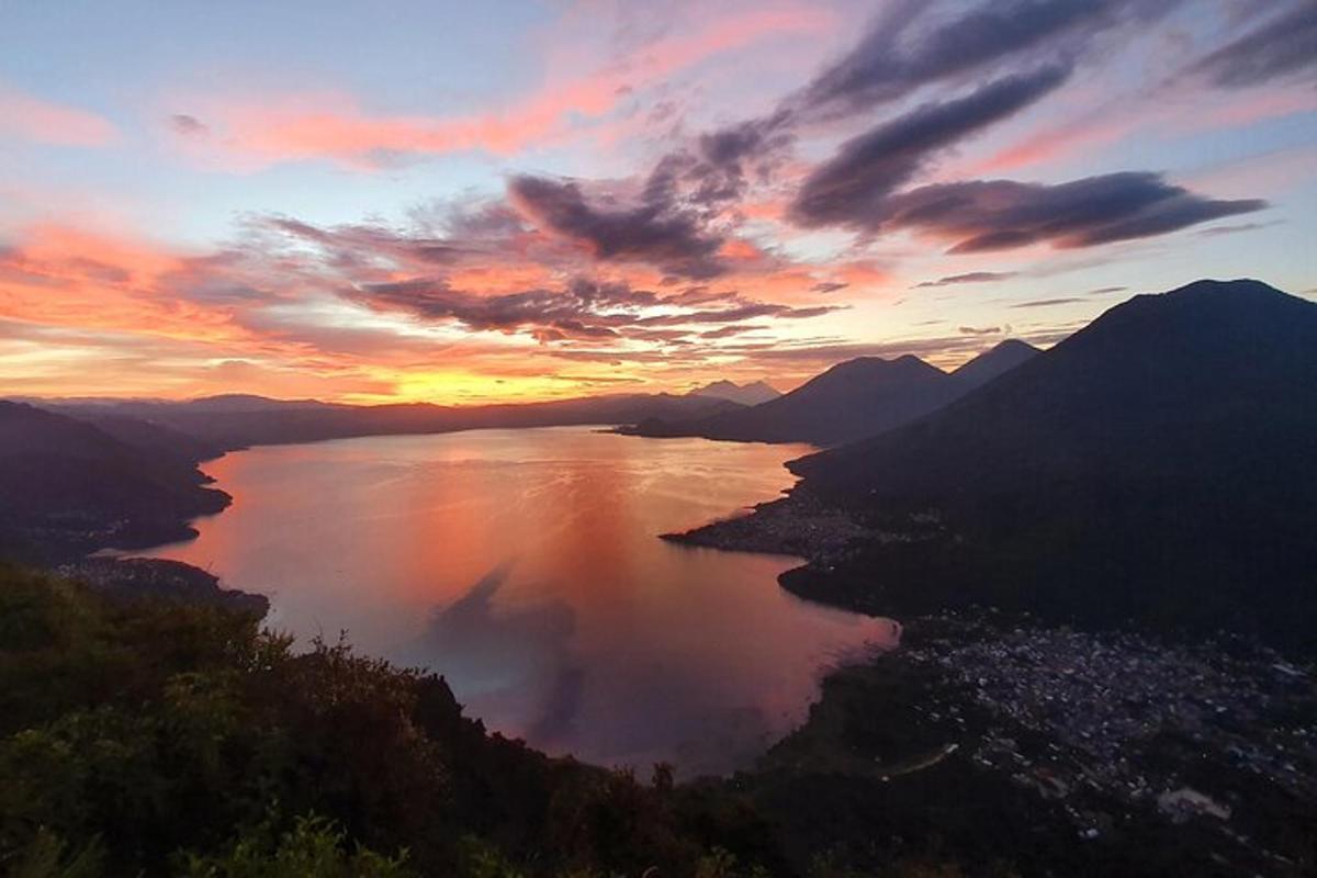 a view of a large body of water at sunset