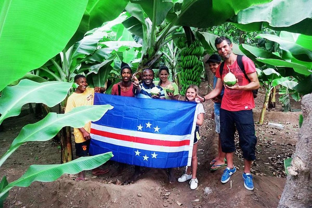 a group of people standing around a flag