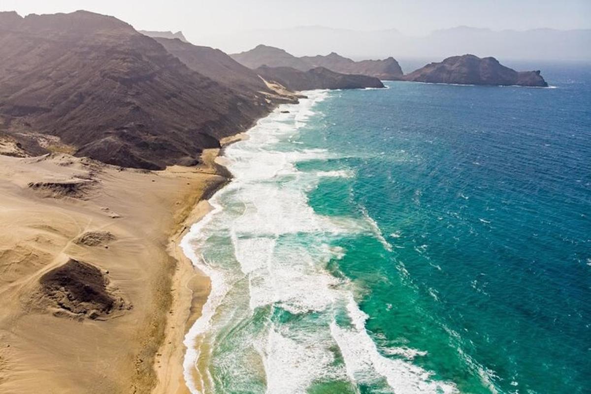 an aerial view of a beach and the ocean