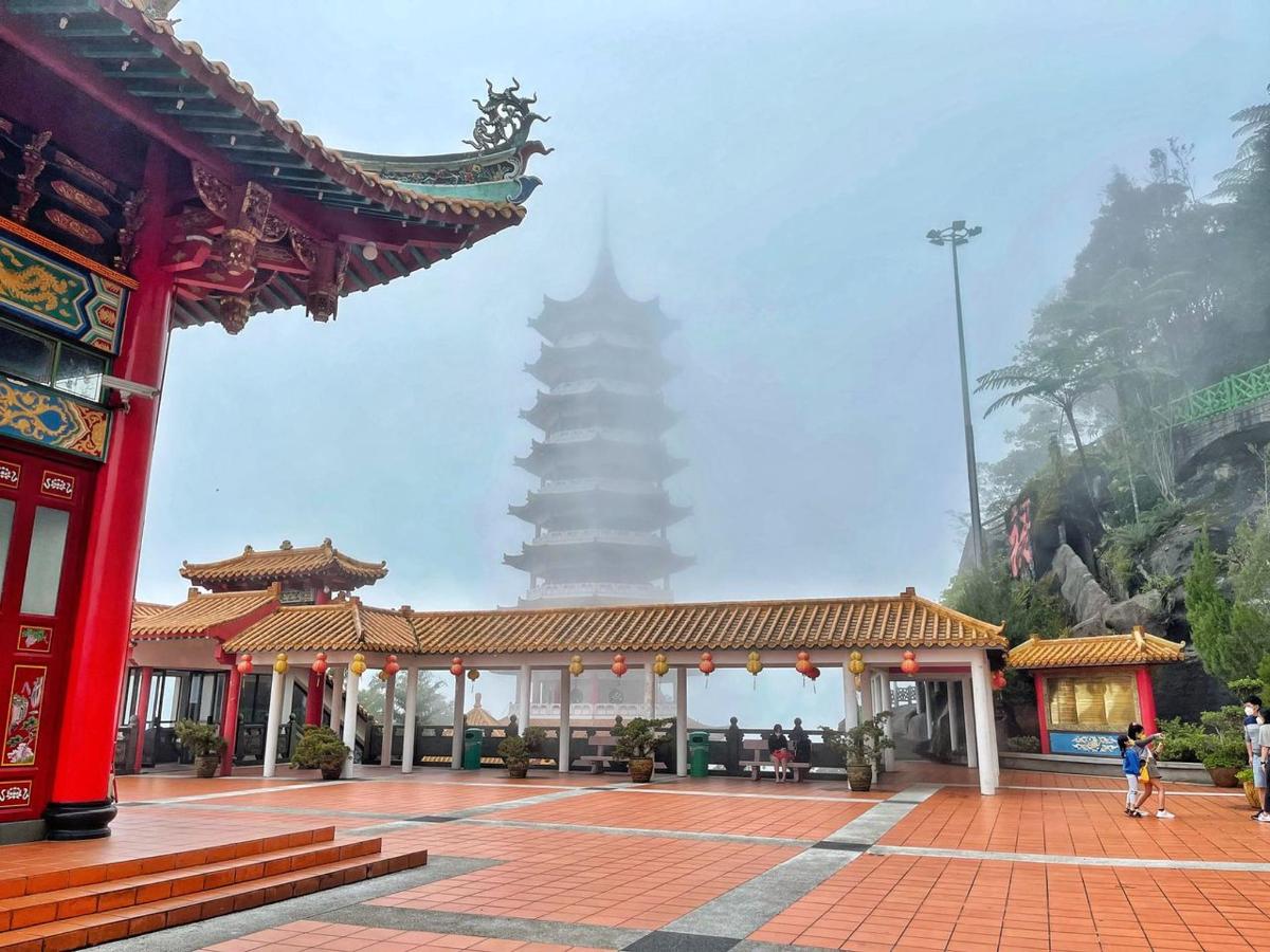 a building with a pagoda in the background
