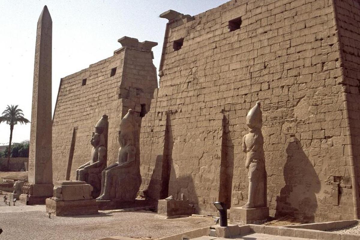 a building with statues on the side of it