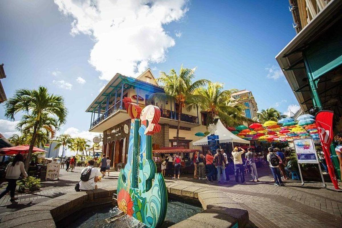 a statue of a surfboard in the middle of a street