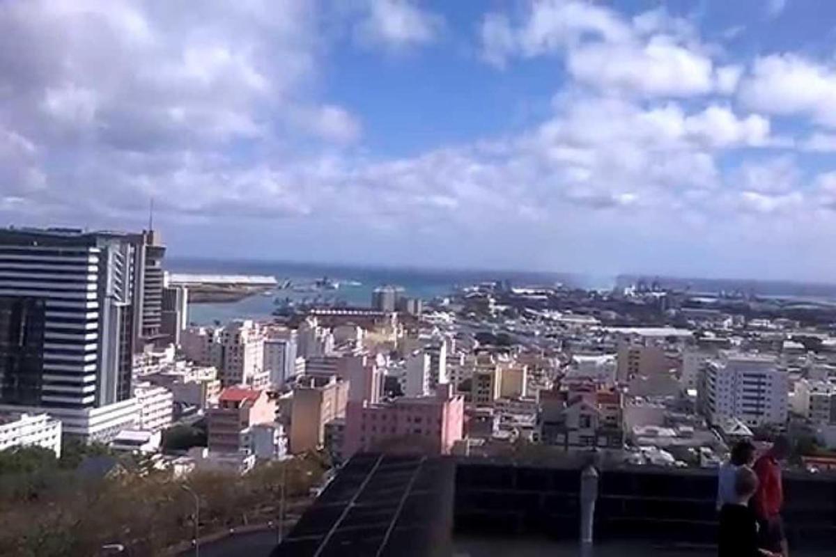 a view of a city from the top of a building