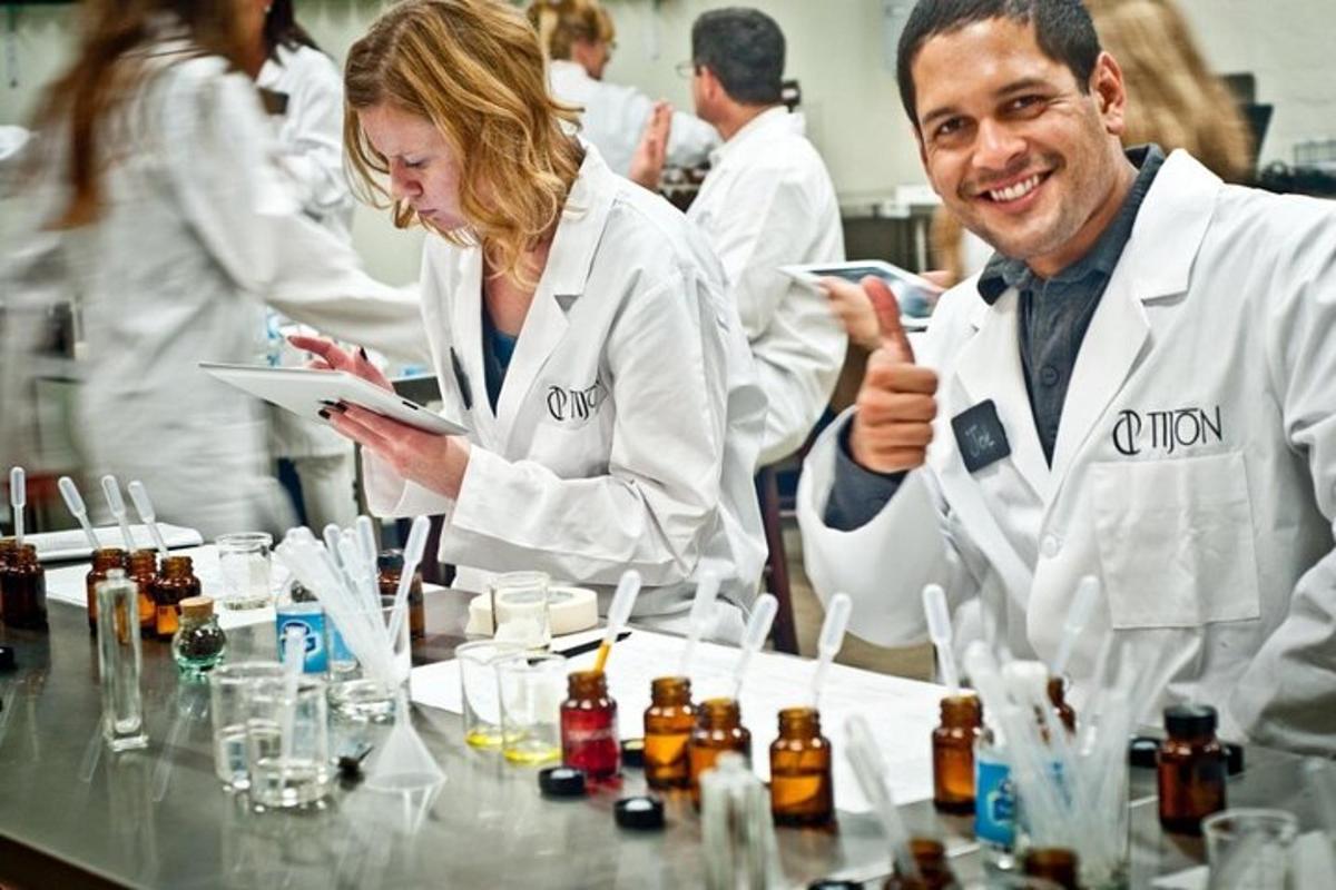 a group of people in white coats in a laboratory