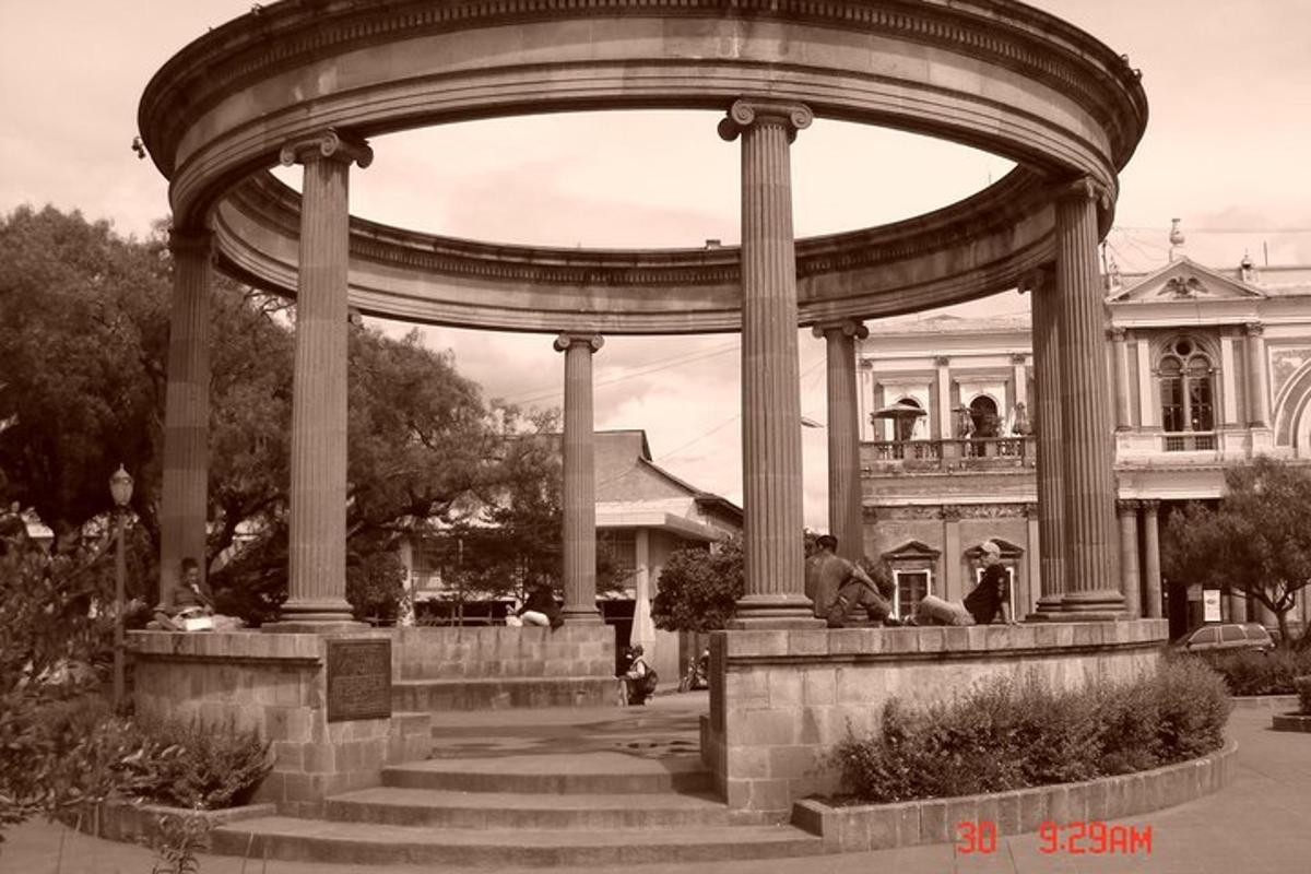 a large arch with stairs in front of a building