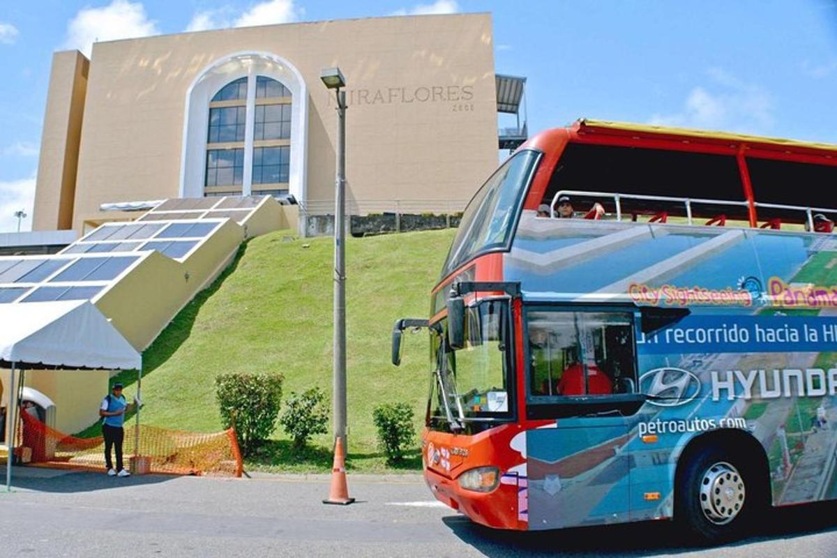 a double decker bus parked in front of a building