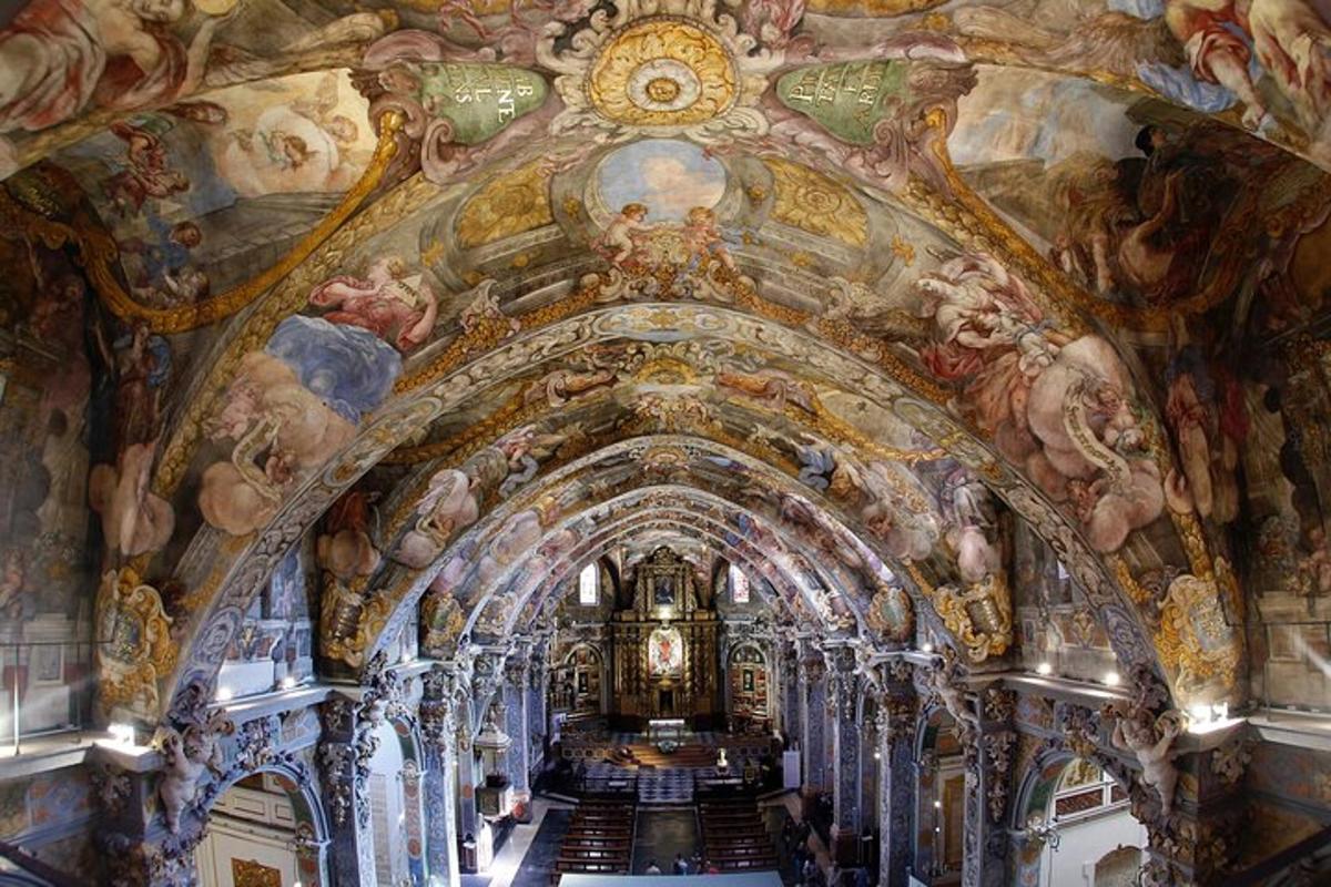 a large room with paintings on the ceilings of a church