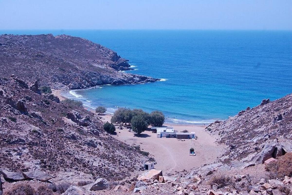 a view of a beach on a rocky mountain