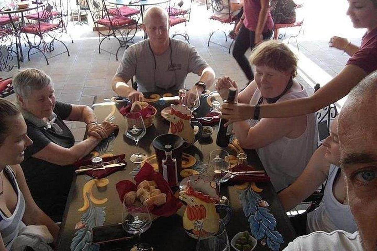 a group of people sitting around a table