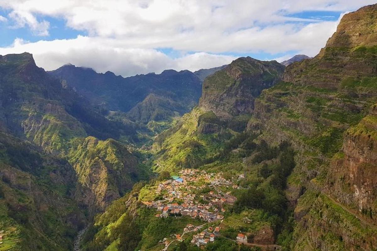an aerial view of a valley in the mountains