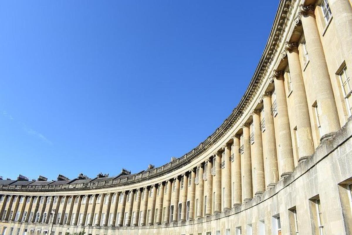 a large building with a blue sky in the background