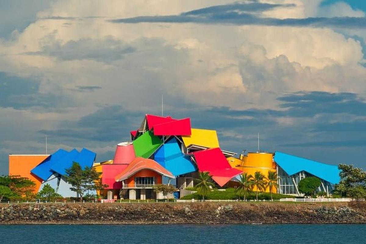 a building with colorful umbrellas on top of it