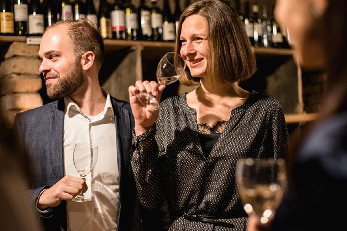a man and a woman holding a wine glass
