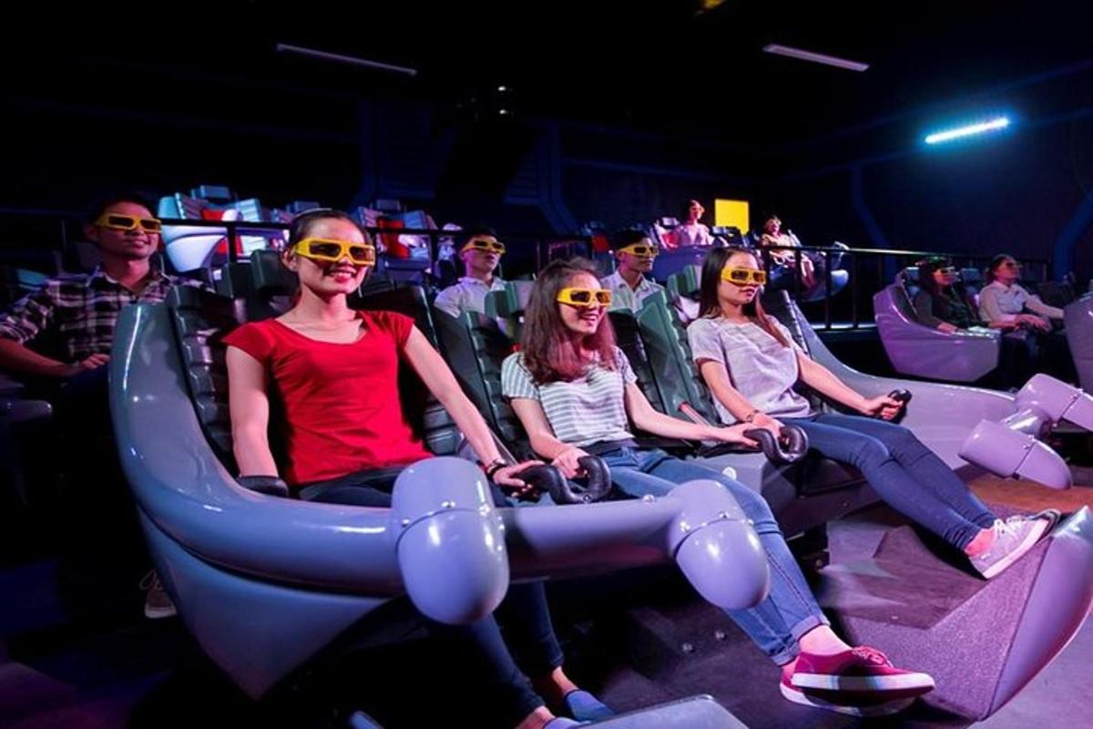 a group of people sitting in an audience wearing sunglasses