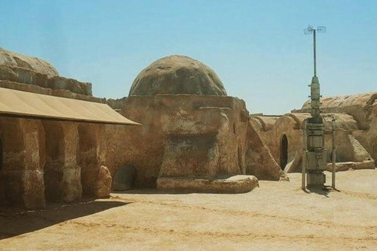 a stone building with a dome on top of it